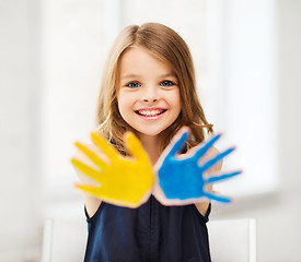 Image showing girl showing painted hands