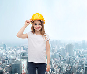 Image showing smiling little girl in protective helmet