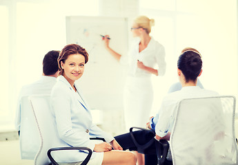 Image showing businesswoman on business meeting in office