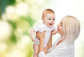 Image showing happy mother with smiling baby