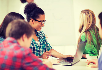 Image showing african student girl with laptop at school