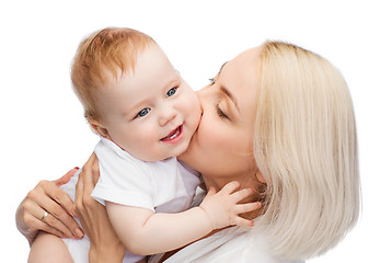 Image showing happy mother kissing smiling baby