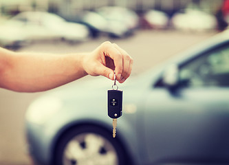 Image showing man with car key outside