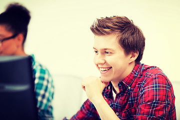 Image showing student with computer studying at school