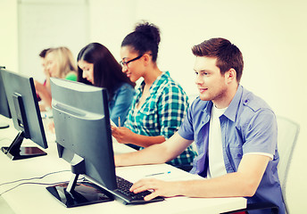 Image showing student with computer studying at school