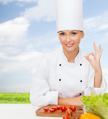 Image showing female chef with vegetables showing ok sign