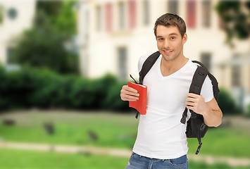 Image showing travelling student with backpack and book