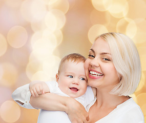 Image showing happy mother with smiling baby