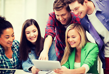 Image showing students looking at tablet pc in lecture at school