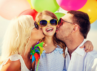 Image showing family with colorful balloons