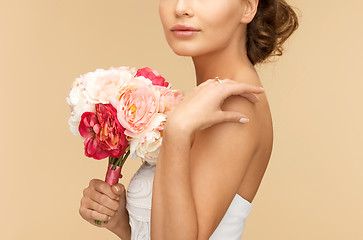 Image showing woman with bouquet of flowers