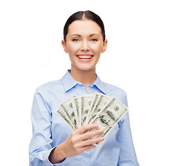 Image showing businesswoman with dollar cash money