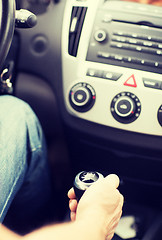 Image showing man shifting the gear on car manual gearbox