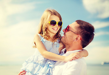 Image showing happy father and child girl having fun outdoors