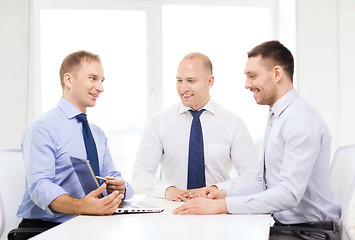 Image showing business team working with laptop in office