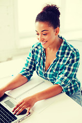 Image showing international student girl with laptop at school