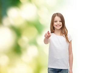 Image showing little girl in blank white t-shirt pointing at you