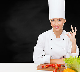 Image showing female chef with vegetables showing ok sign