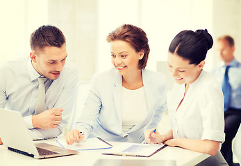 Image showing business team discussing something in office