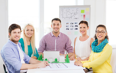 Image showing smiling architects working in office