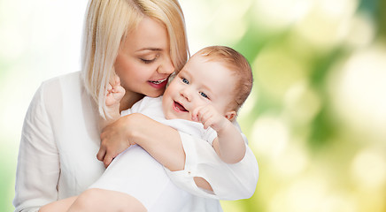 Image showing happy mother with smiling baby