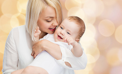 Image showing happy mother with smiling baby