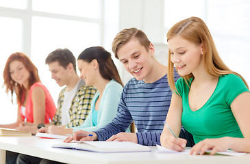 Image showing students with textbooks and books at school