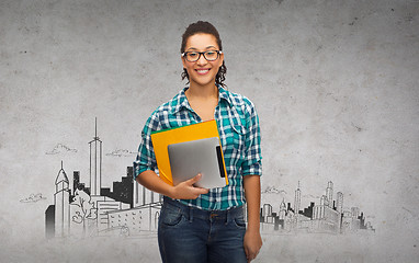 Image showing student in eyeglasses with folders and tablet pc