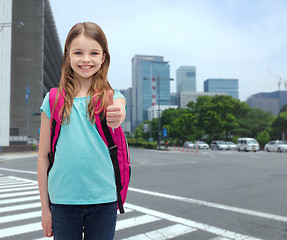 Image showing smiling girl with school bag showing thumbs up