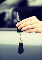 Image showing man with car key outside