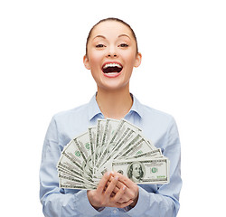 Image showing young businesswoman with dollar cash money