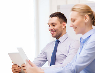 Image showing business team working with tablet pc in office