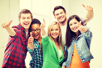 Image showing students showing thumbs up at school