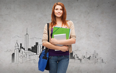 Image showing smiling student with bag, folders and tablet pc