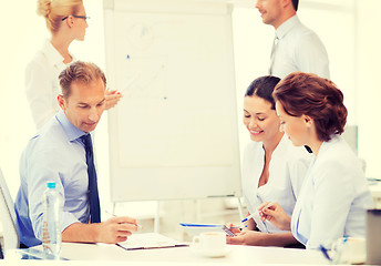 Image showing business team discussing something in office