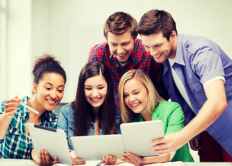 Image showing students looking at tablet pc in lecture at school