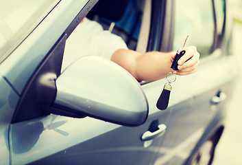 Image showing man with car key outside