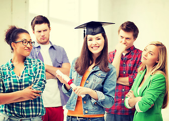 Image showing girl in graduation cap with certificate