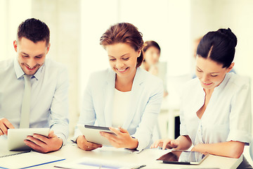 Image showing business team working with tablet pcs in office