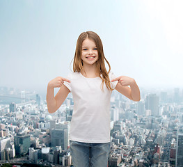 Image showing smiling little girl in blank white t-shirt