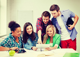 Image showing students looking at tablet pc at school