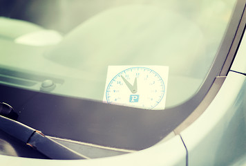 Image showing parking clock on car dashboard