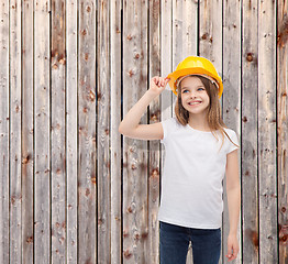 Image showing smiling little girl in protective helmet