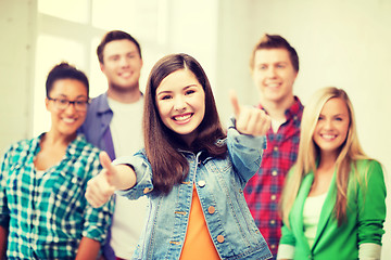 Image showing students showing thumbs up at school