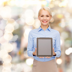 Image showing businesswoman with blank black tablet pc screen