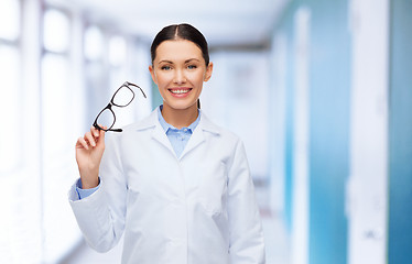 Image showing smiling female doctor without stethoscope