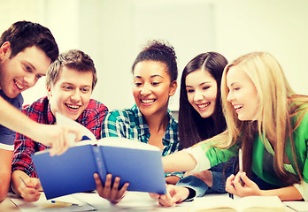 Image showing students reading book at school