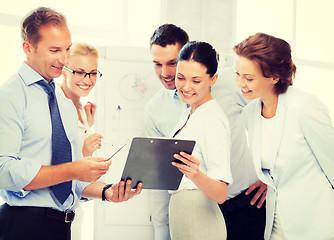 Image showing business team discussing something in office