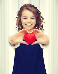 Image showing girl with small heart