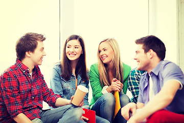 Image showing students communicating and laughing at school